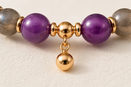 AUVRESSA amethyst bracelet finishing detail with gold spacers and charm