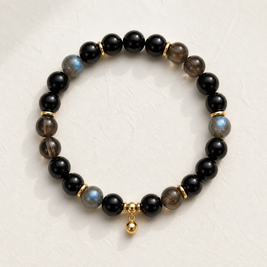 Onyx Meridian Bracelet on warm ivory background