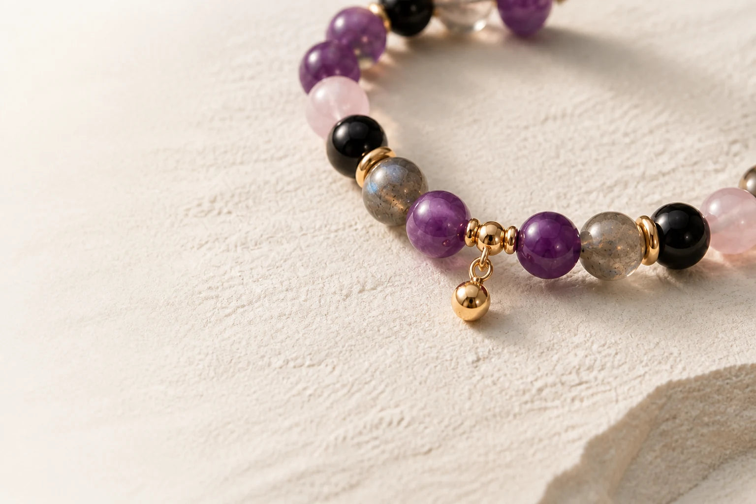 AUVRESSA gemstone bracelet in warm editorial light